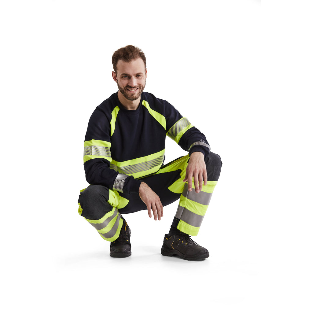 Blaklader 1587 Multinorm Inherent Trousers With Stretch Hi Vis Yellow Navy Blue Feature 1