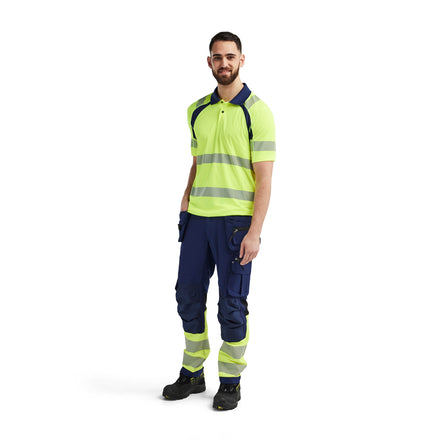 Blaklader 3595 Hi Vis Uv Protected Polo Shirt Hi Vis Yellow Navy Blue Model
