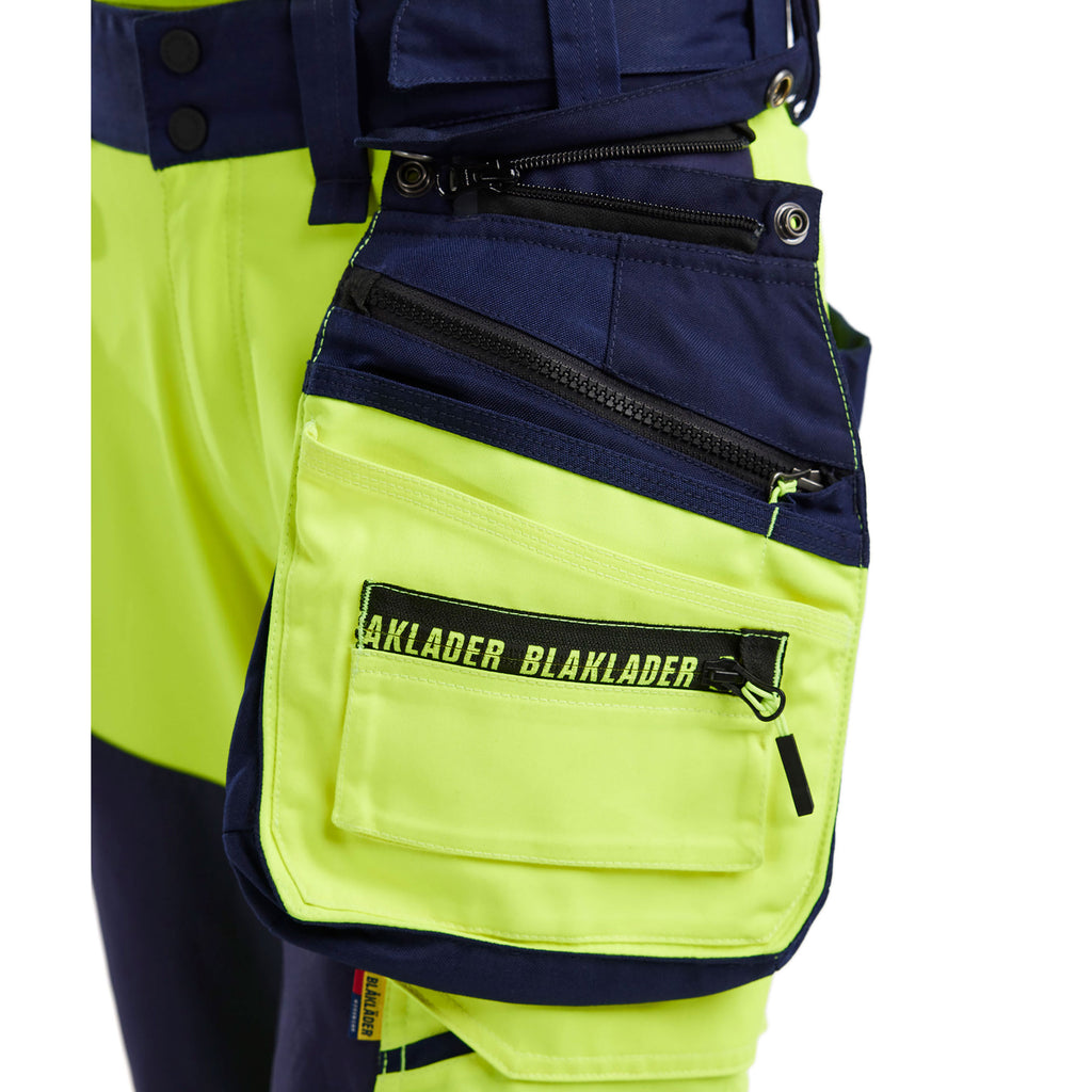 Blaklader 7118 Womens Hi Vis Softshell Trousers Hi Vis Yellow Navy Blue Feature 1