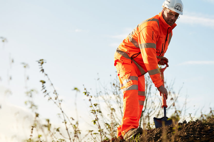 man using insulated spade