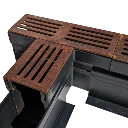 Alusthetic PVC Threshold Drain With Corten Steel Grating T Connector