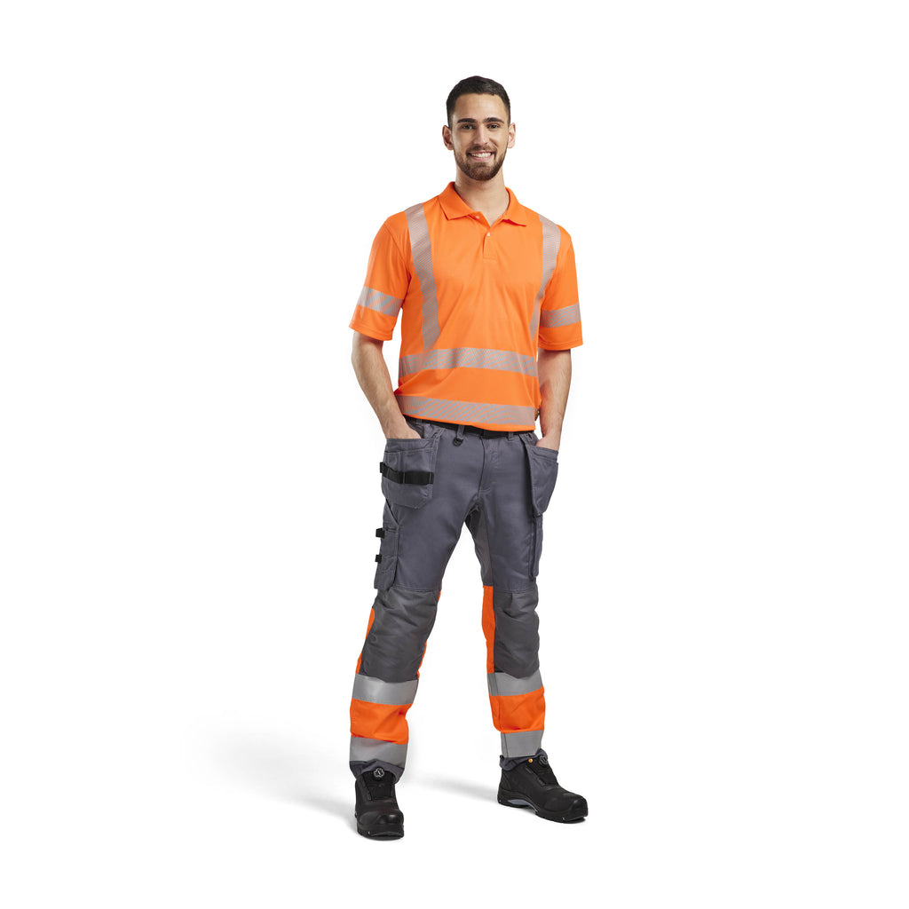 Blaklader 3428 Uv Protected Hi Vis Polo Shirt Hi Vis Orange Navy Blue Model