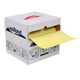 Spillpod box with yellow absorbent pad on a white background