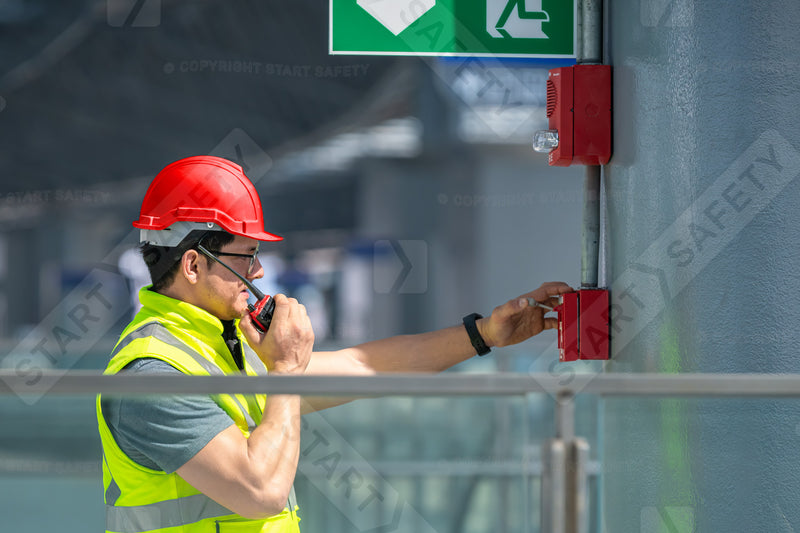 Fire Marshall Wearing A Red Safety Helmet
