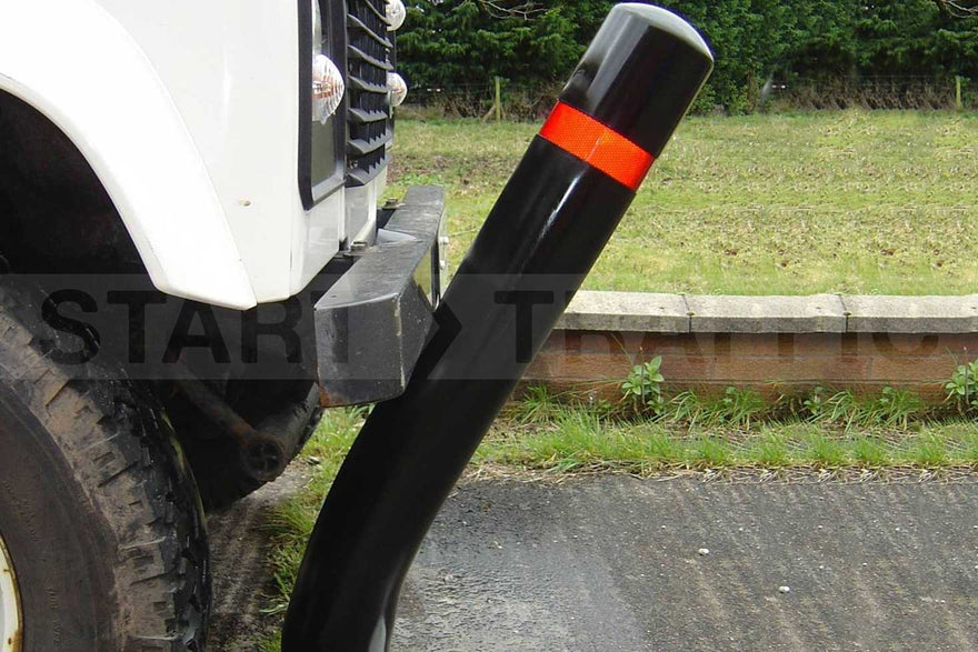 Bollard Being Flexed by Land Rover