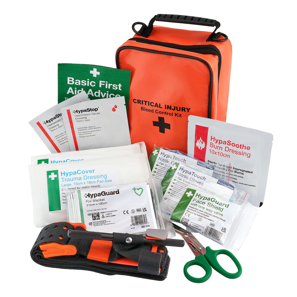 A first aid kit set displayed on a white background, including an orange bag labeled 'CRITICAL INJURY Blood Control Kit,' multiple HypaGuard and HypaStop medical supplies, a black-and-orange tourniquet, green-handled scissors, and other packaged wound care items.