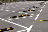 park-aid wheel stopper installed in large car park