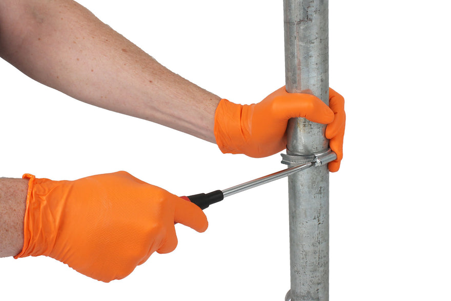 SW Orange Gripper Disposable Gloves In Use