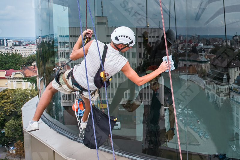 Window Cleaner Working In Suspension With Rope-and-grab Type Setup
