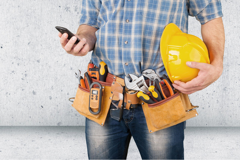 Tradesman With A Yellow Hard Hat