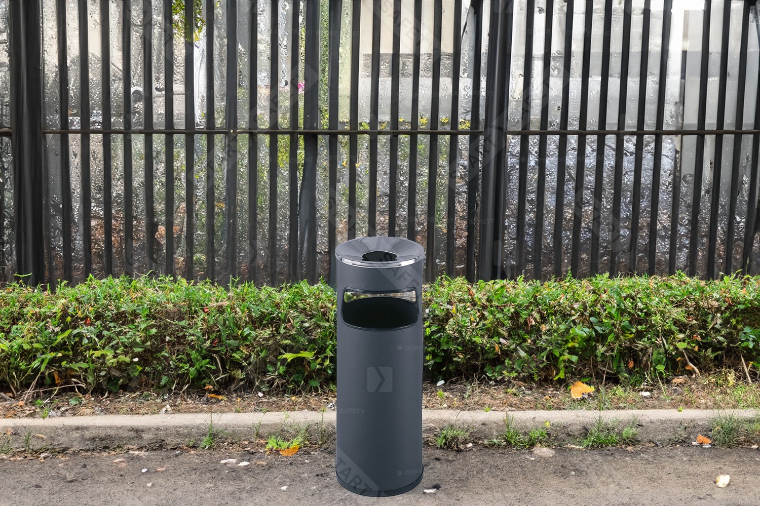 Procity Ashtray Litter Bin Installed In Public Setting In A Car Park Next To Fence