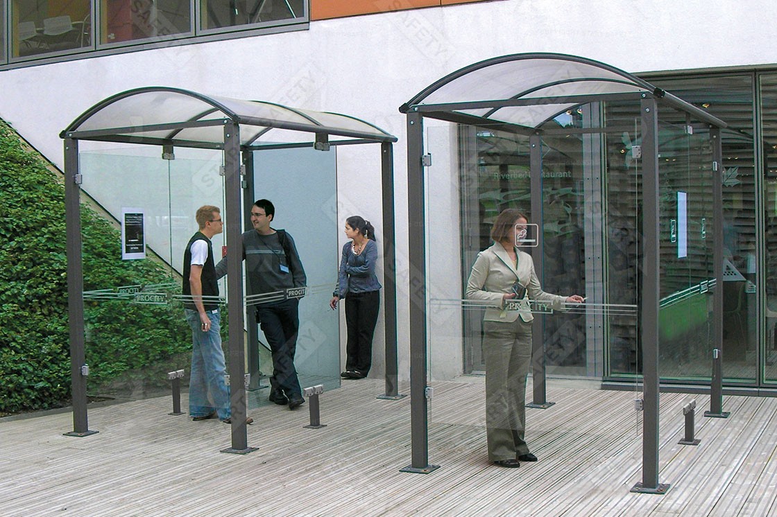 Two Procity Voute Medium Smoking Shelters Installed face To Face Near Commercial Property