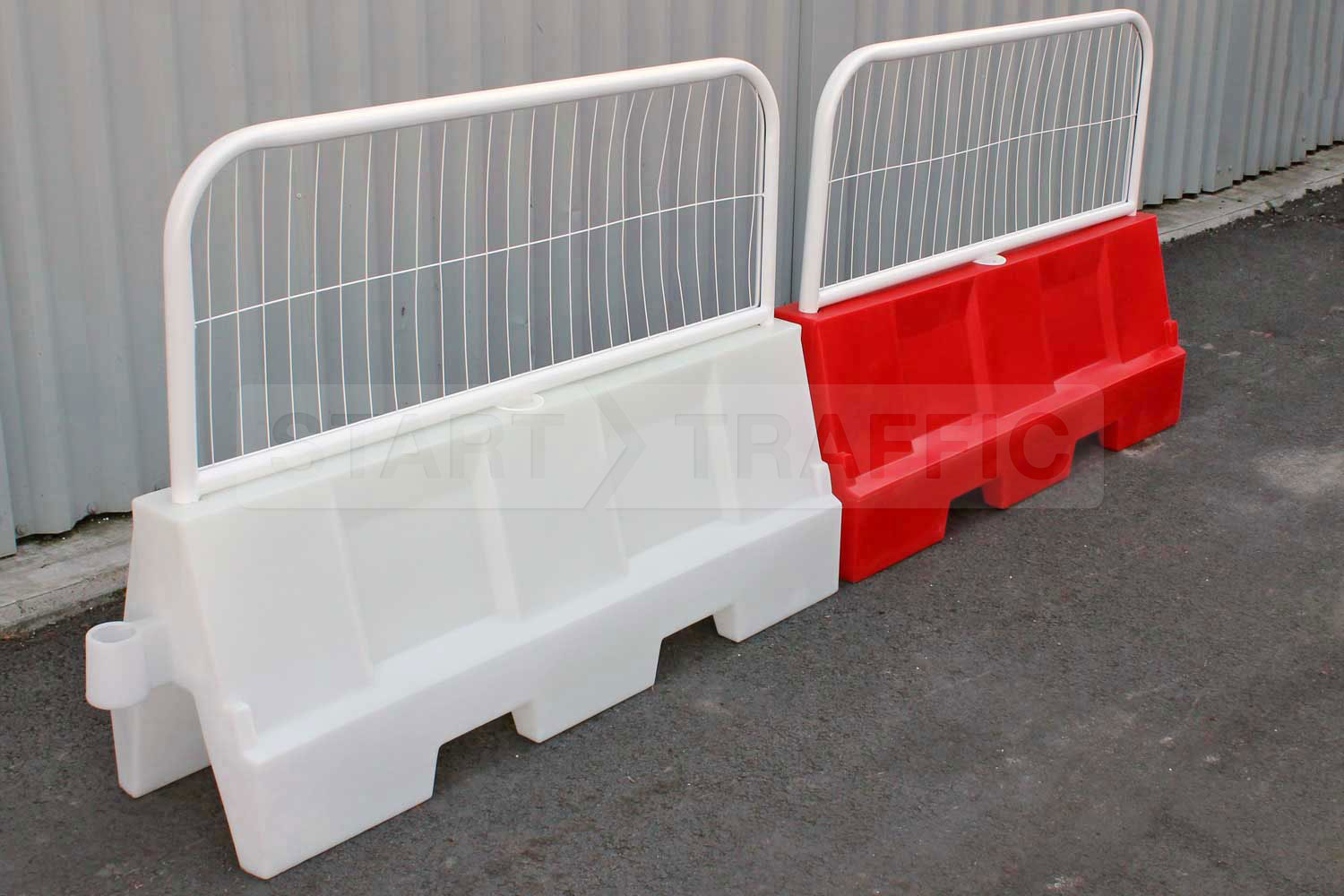 Fence topped Water Filled Barriers