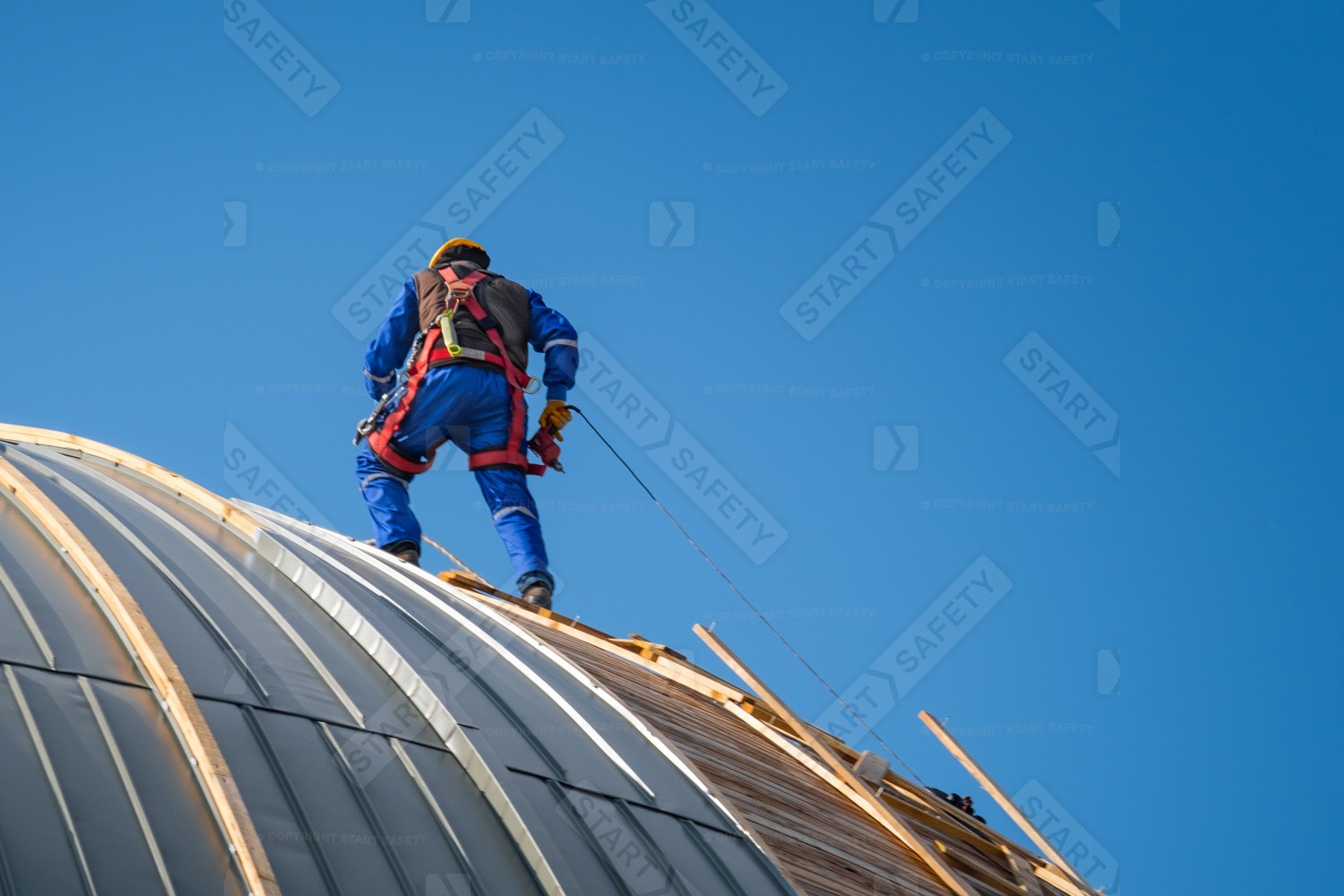 Roofer With A Height Safety Kit