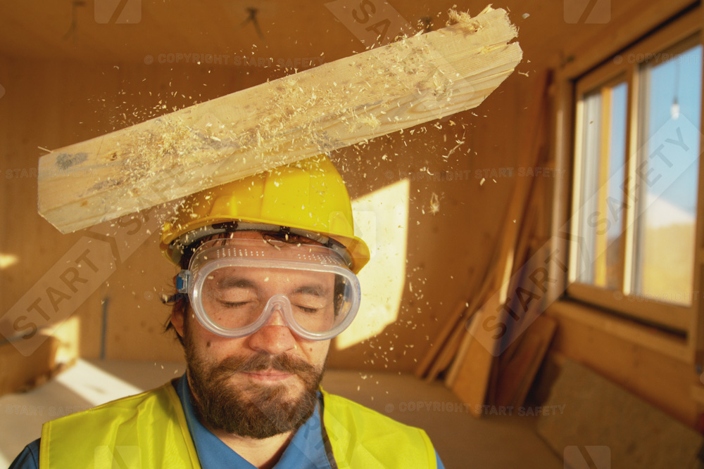 Worker Getting Hit In The Head With A Piece Of Lumber
