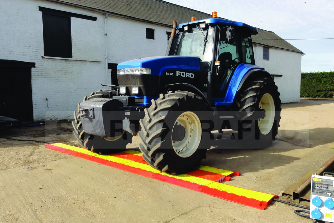 Tractor Crossing Checkers Cable Ramps