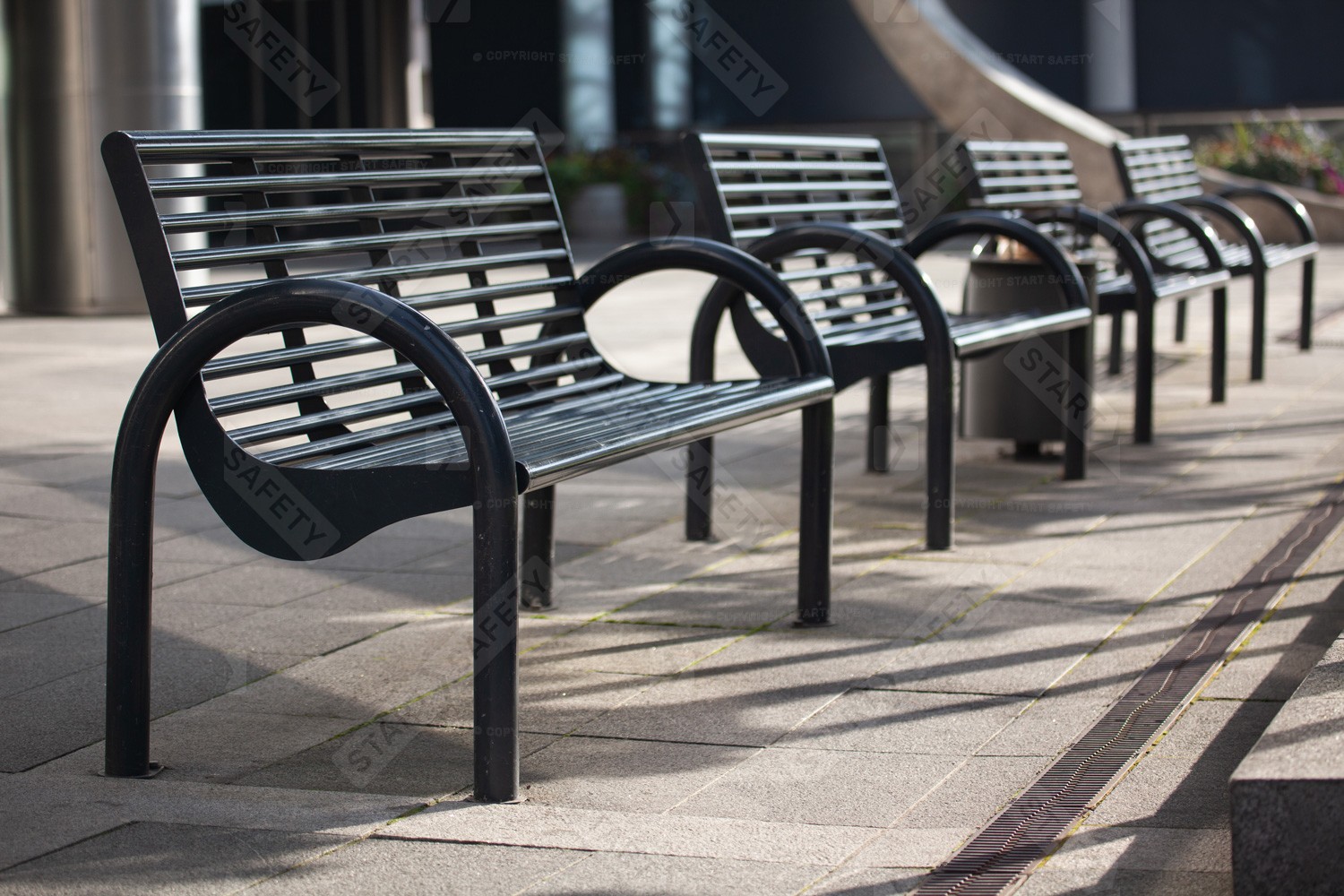 Collection Of Full Steel Modular Seat Benches Next To Road