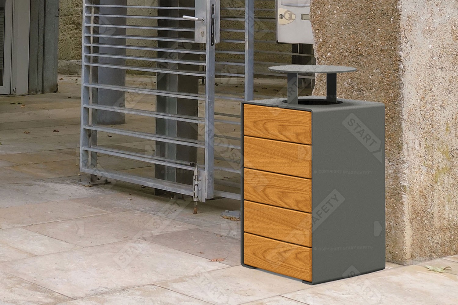Procity Kube Bin With Lid In Wood installed next To Town Wall