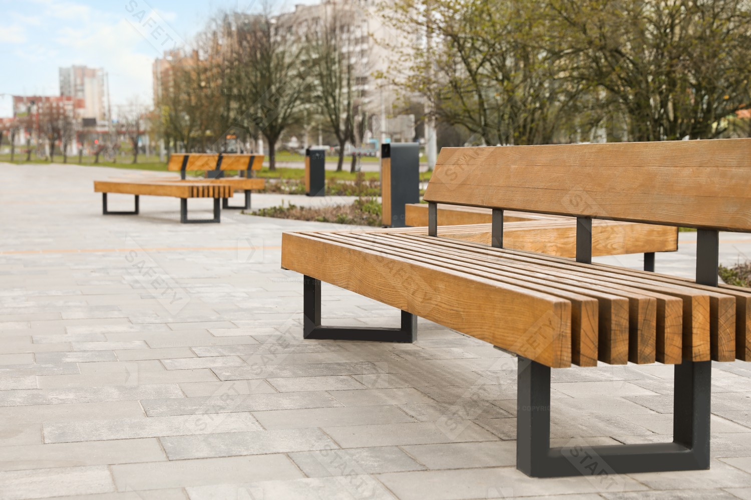 Modern Wooden City Bench On A Square