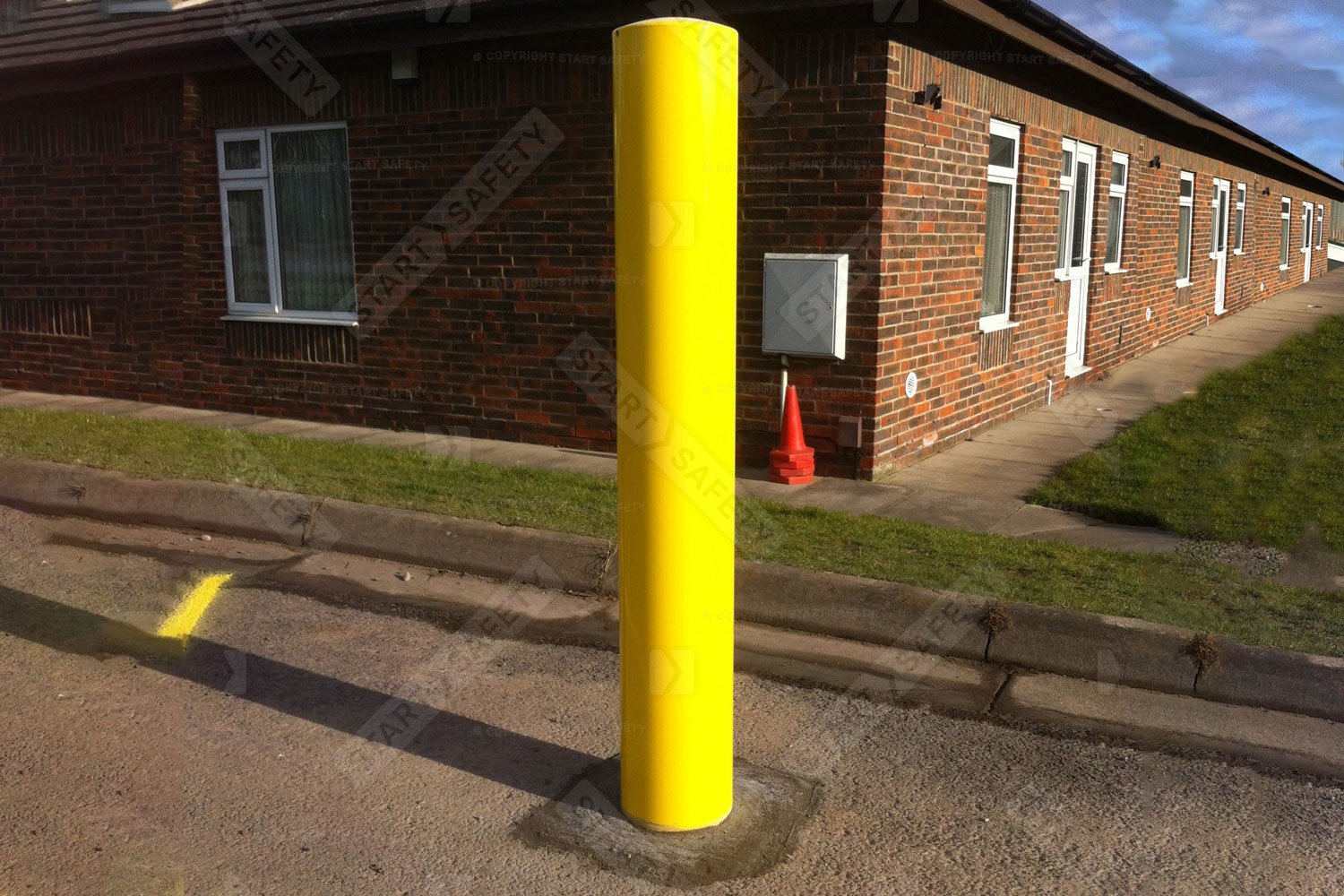 yellow bollard installed