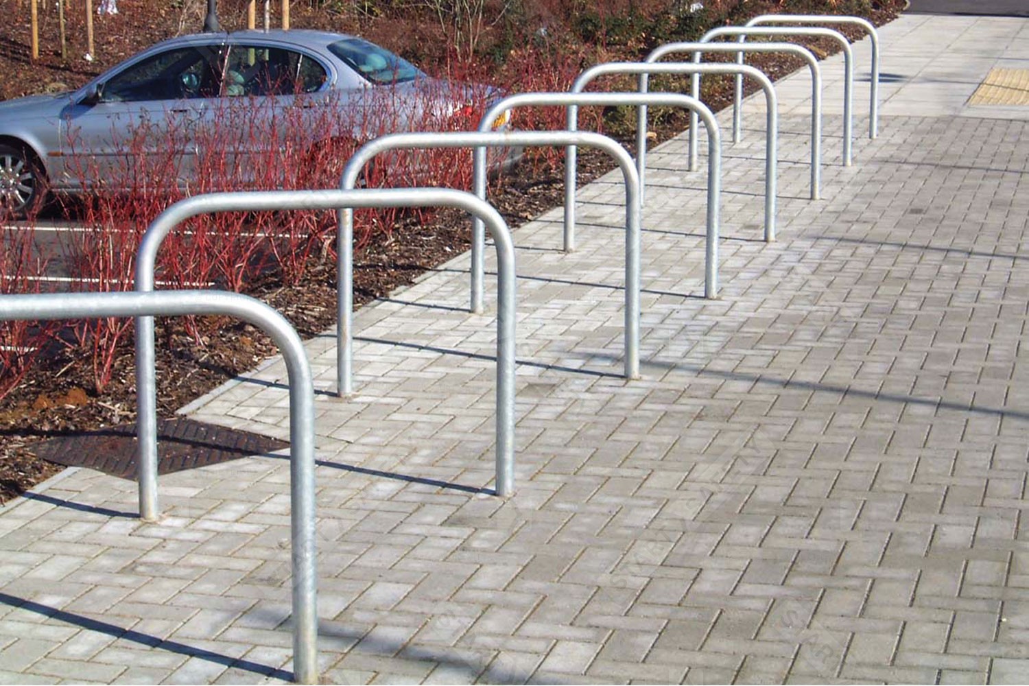 Sheffield cycle stand installed into block paving
