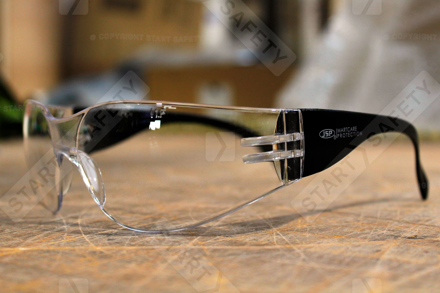 jsp m9400 wraplite glasses on work bench