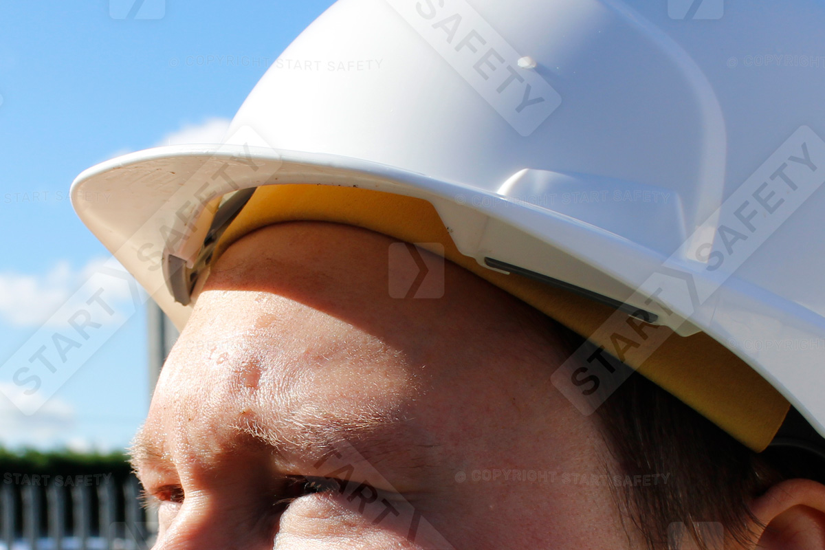Construction Worker Wearing A Evolite Hard Hat With Chamlon Sweatband