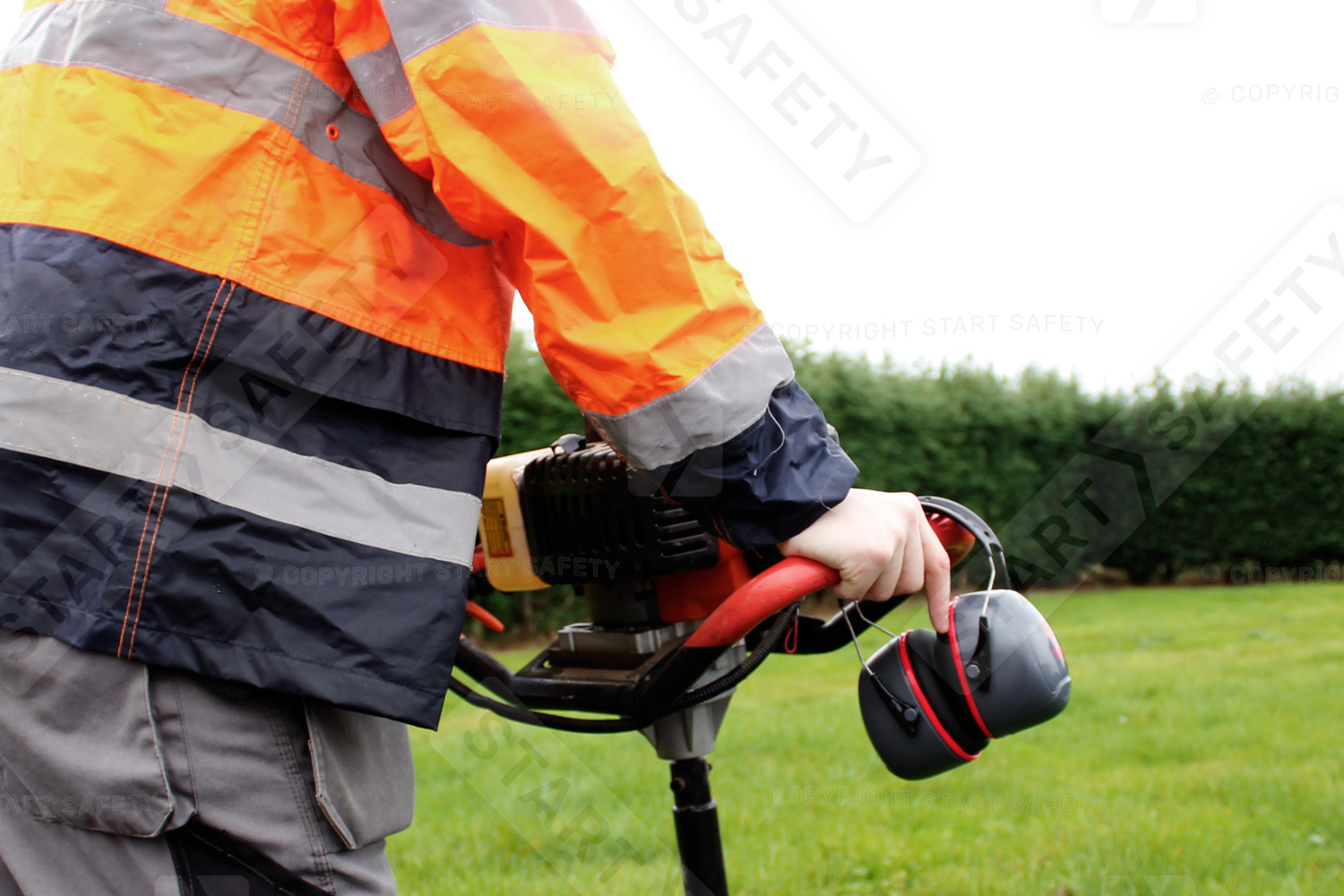 Sonis 3 ear defenders Head Band in use with site equipment