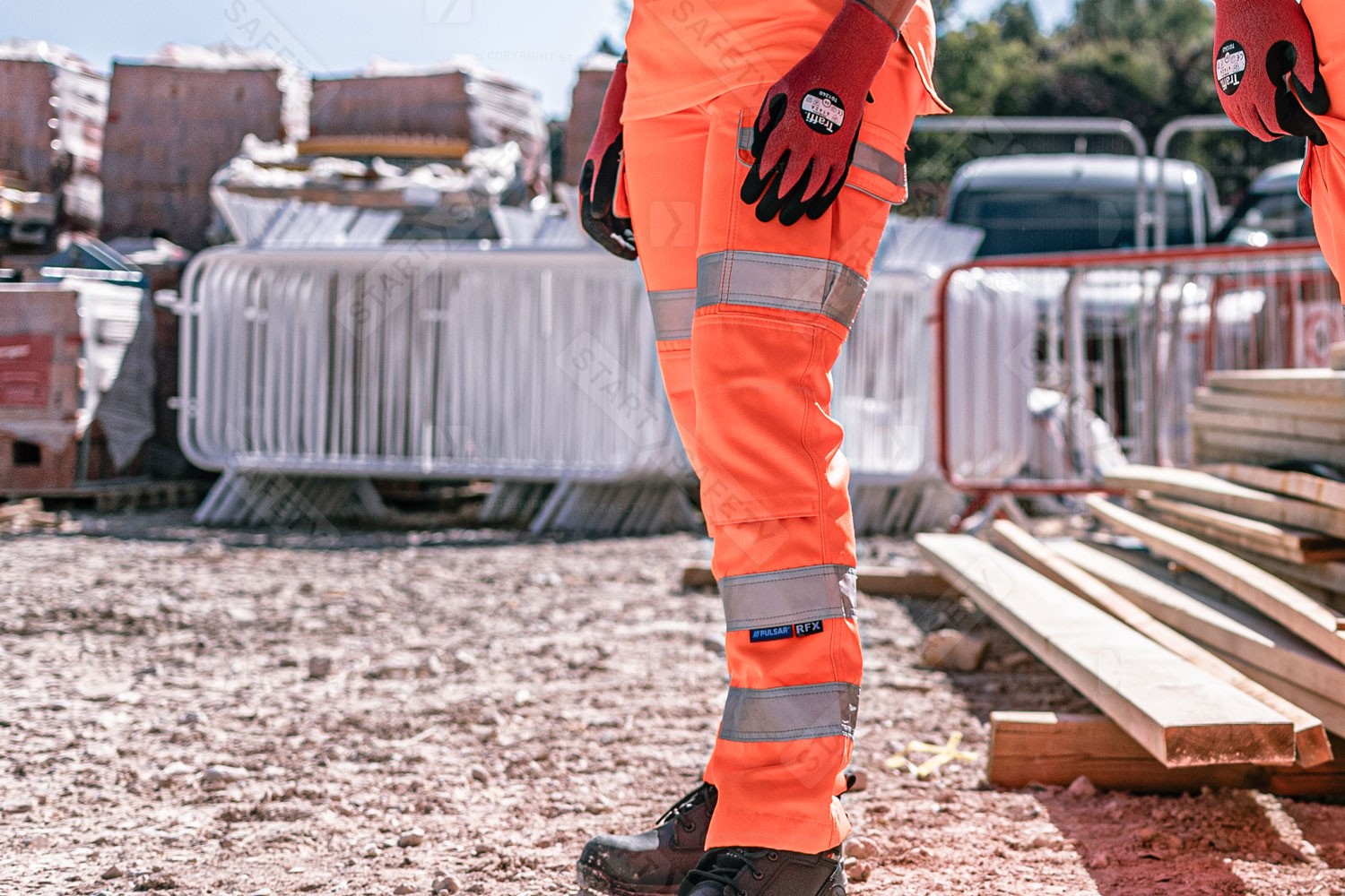 Woman Construction Worker Wearing Pulsar PR336LDS Hi Vis Orange Combat Trousers