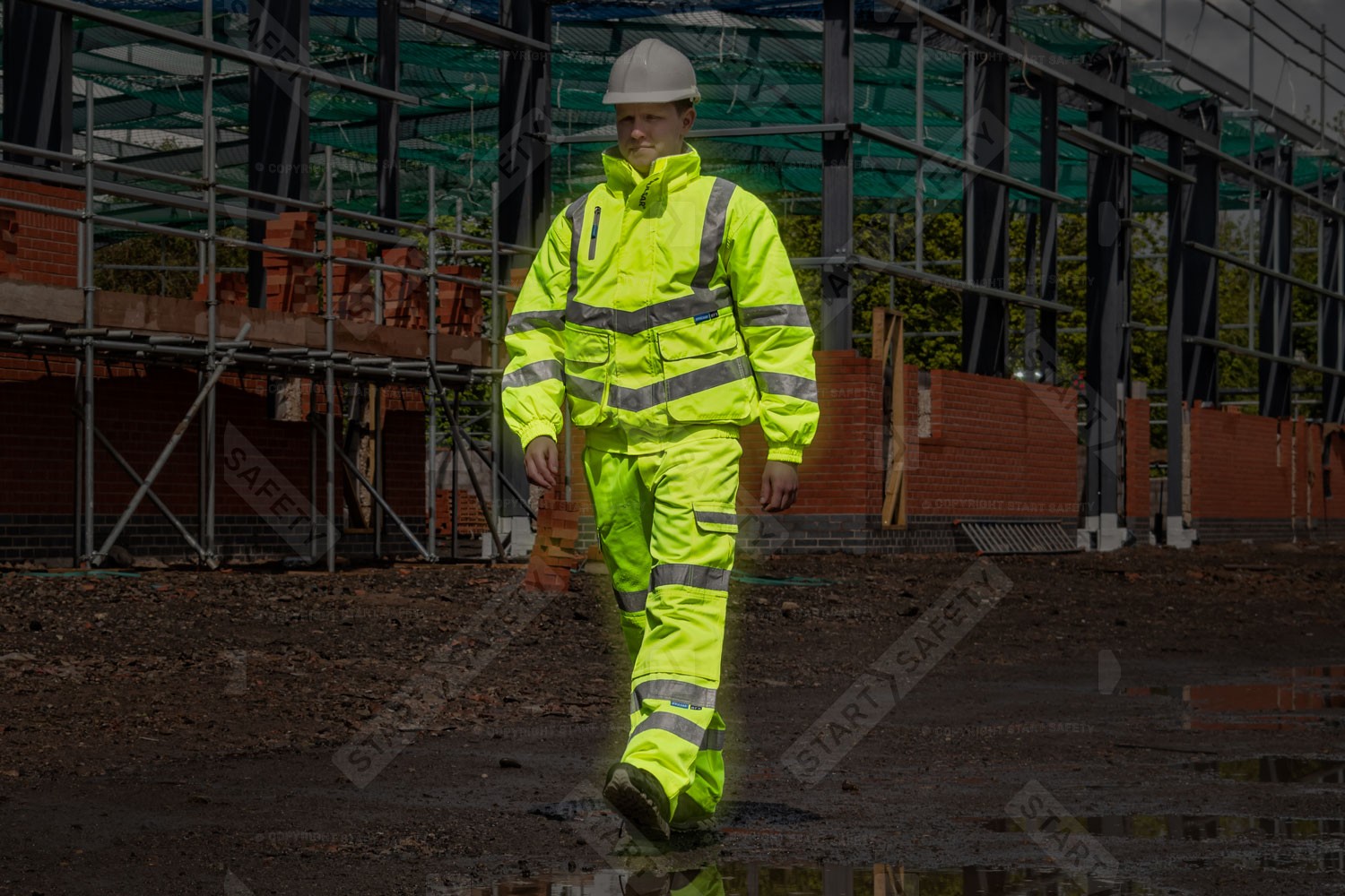 Worker With Vibrant and Highly Reflective Clothing