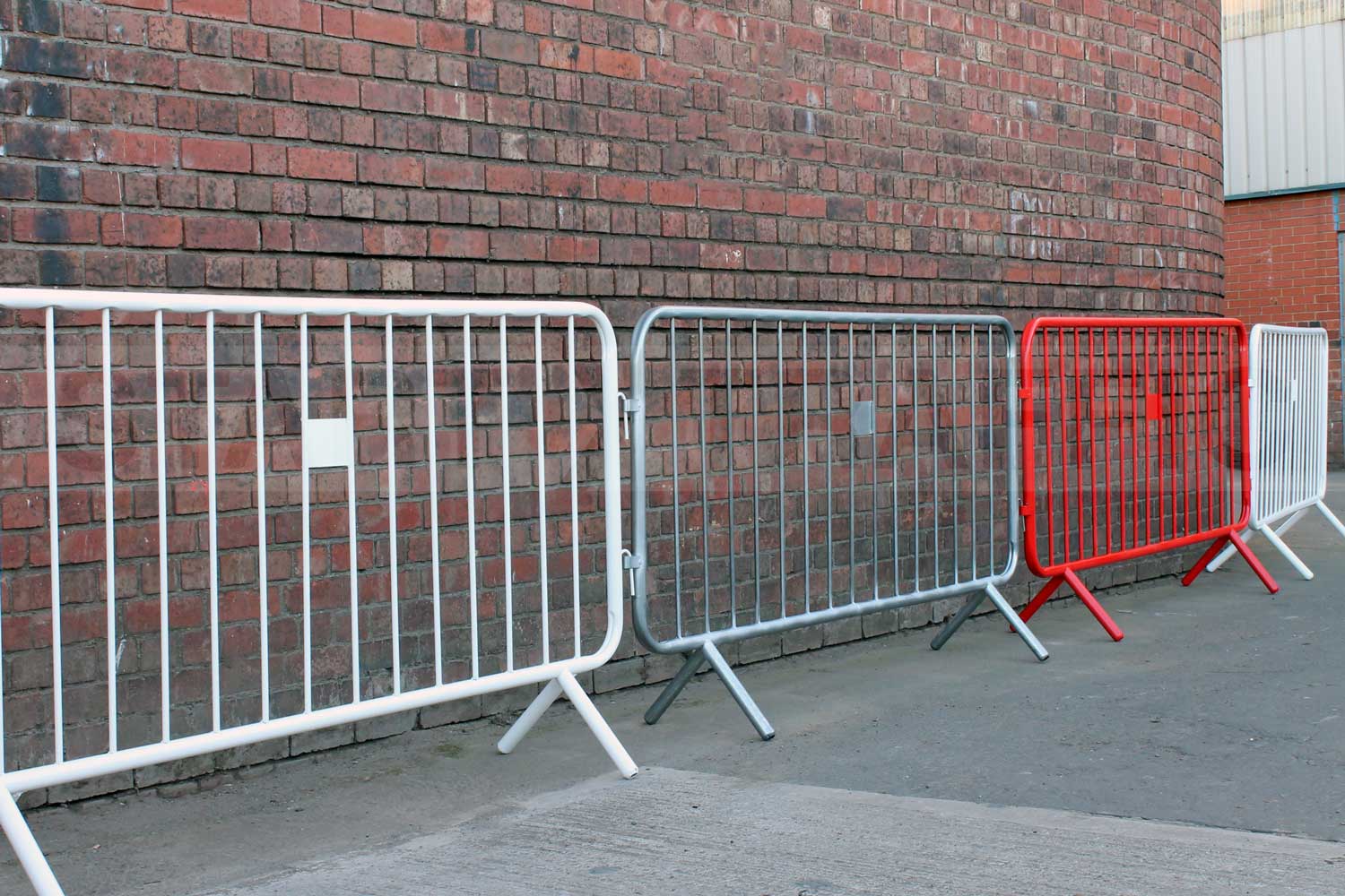 Crowd Control Barriers Infront Of A Wall