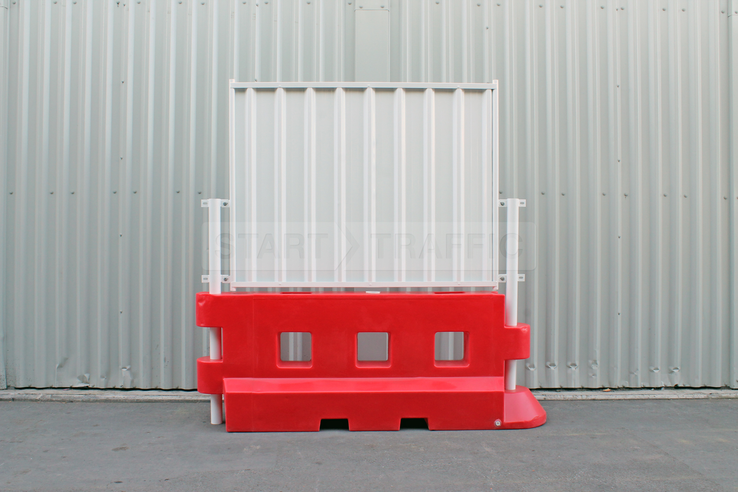 hoarding panels with Red GB2 barriers