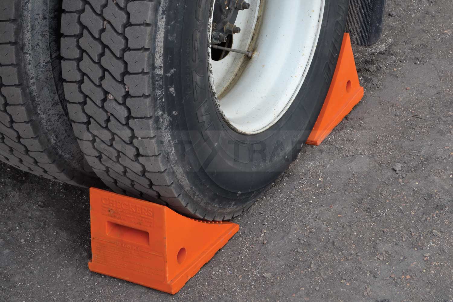 Wheel Chock Positioned At the Centre Of A Tyre