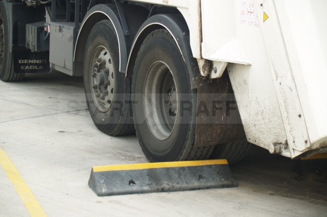 Truckstop Against Rear of Tyre Close Up